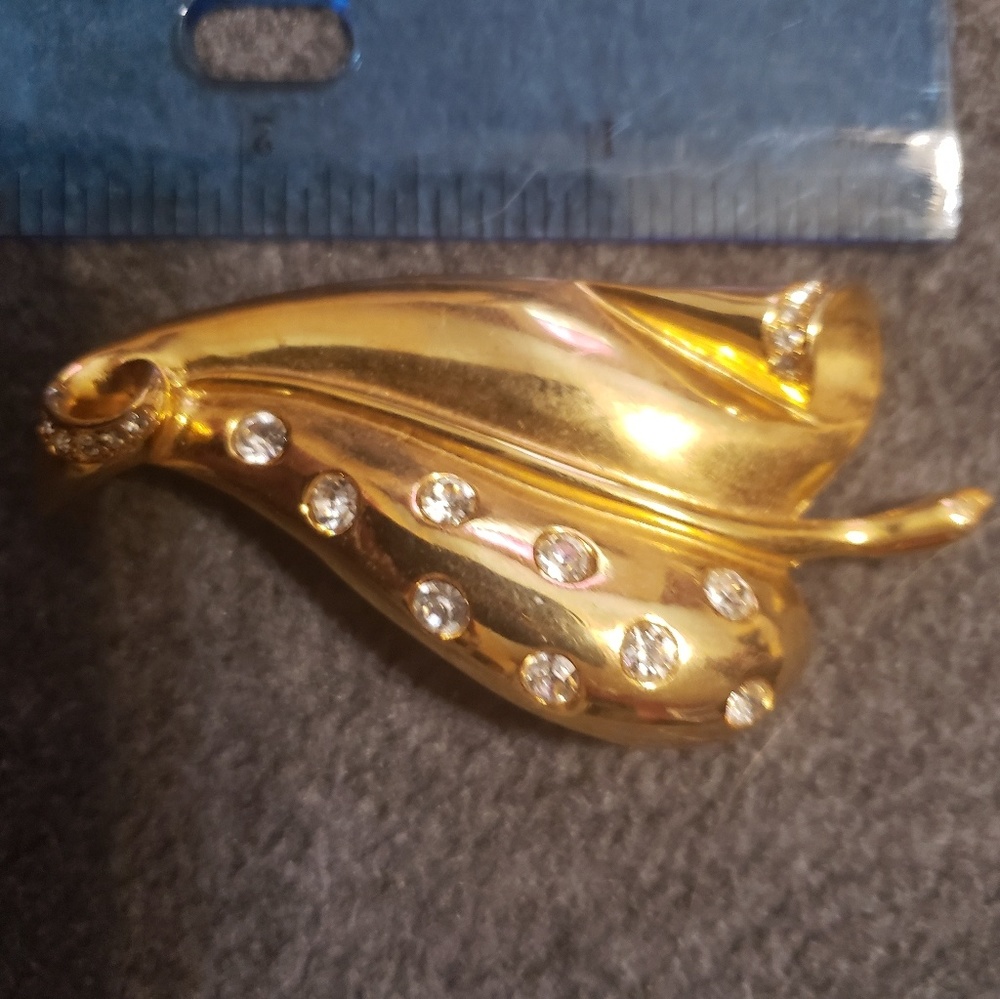 Goldtone leaf pin with faux diamonds